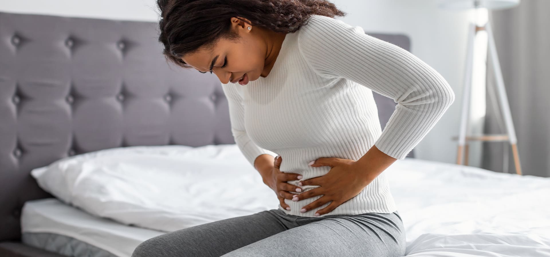 Woman considering Emsella treatment for incontinence
